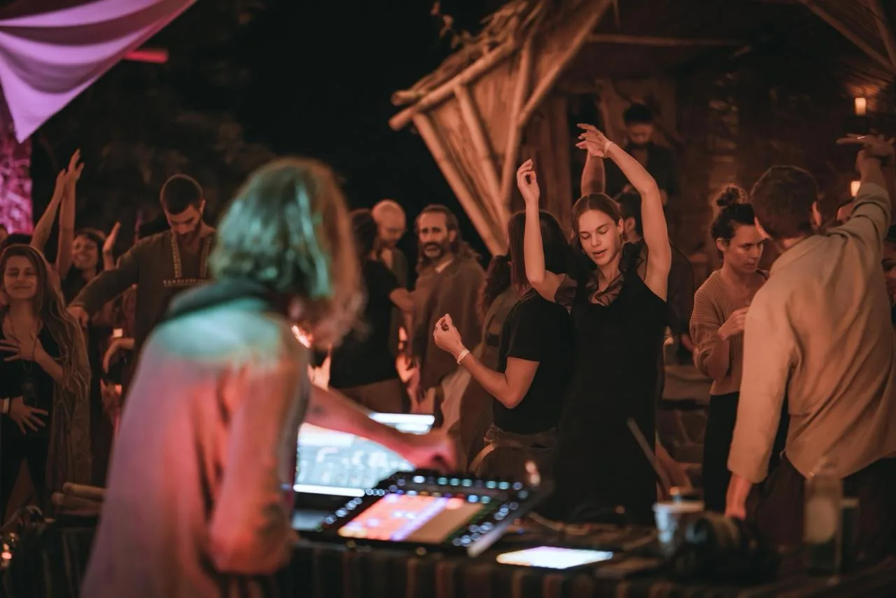 An ecstatic ceremony dance floor at night